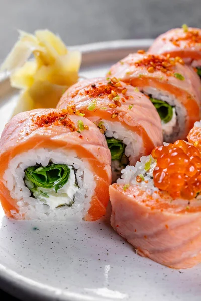 Sushi Roll Salmon Red Caviar Filled Philadelphia Cheese Lettuce Wrapped — Zdjęcie stockowe