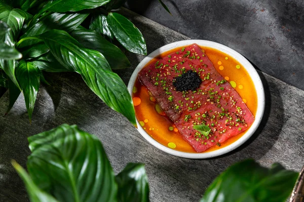Thinly Sliced Tuna Fillet Carpaccio Black Caviar Finely Chopped Green — Stockfoto