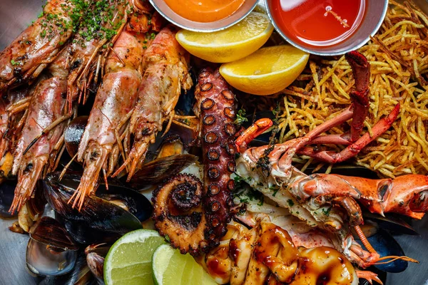 Metal Tray Lies Assortment Grilled Seafood Tiger Prawns Octopus Lobster — стоковое фото