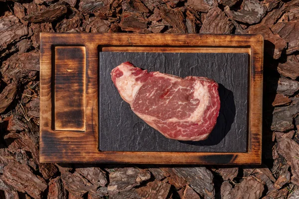 Raw Piece New York Beef Steak Lies Wooden Board Slate — Photo