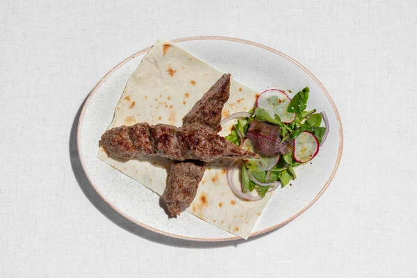 Lamb Kebab Two Pieces Lamb Kebab Lie Sheet Thin Pita — стоковое фото