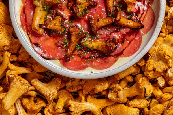Veal Carpaccio Fried Chanterelle Mushrooms Food Lies Light Ceramic Plate — Stok fotoğraf
