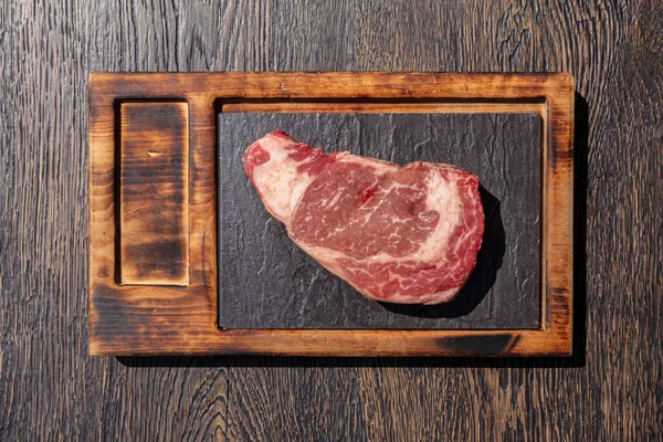 Raw Piece New York Beef Steak Lies Wooden Board Slate — Stock Photo, Image