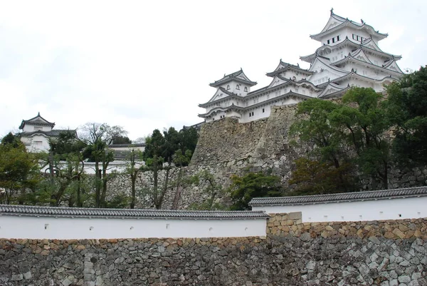 view of Himeji Castle in Kyoto Japan with walls