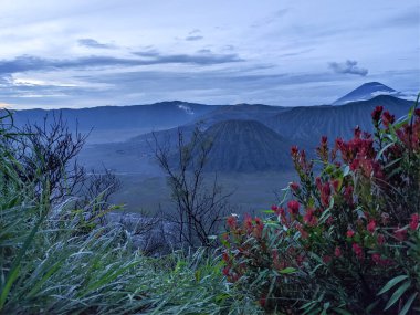 Mountain landscape with blue sky, clouds in the background. The view of the mountains. 