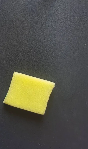 Yellow Sponge Black Background — Foto Stock