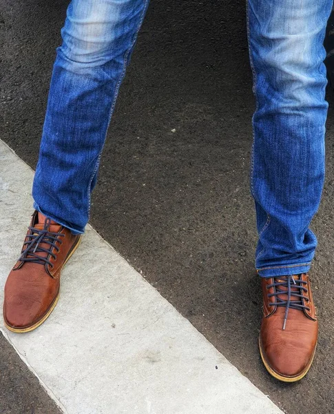 Lower Legs Standing Man Wearing Blue Denim Jeans Brown Leather — Fotografia de Stock
