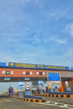 West Java in July 2022. A new toll gate that will be operational this year. This toll gate has a local ethnic Jakarta style, with a typical Betawi motif.
