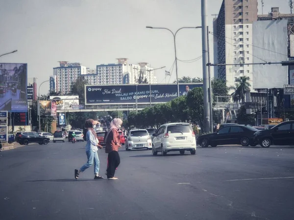 West Java July 2022 Two Muslim Women Headscarves Crossing Road —  Fotos de Stock