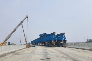 This is the steel structure of a launcher gantry that will be used for erection precast concrete I Girder. One of method for erection girder in construction project.