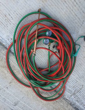 This is a photo of the compressor hose, that have two gauge for monitoring the indicator.