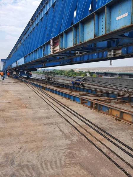 This is the steel structure of a launcher gantry that will be used for erection precast concrete I Girder. One of method for erection girder in construction project.