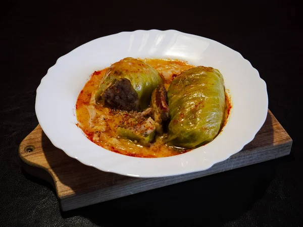 Popular croatian homemade stew dish sarma which is prepared during winter season and made of ground meat wrapped in sour cabbage leafs and cooked in cabbage stew.