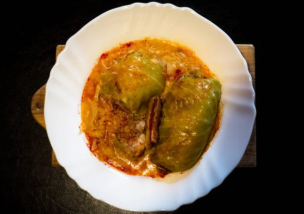 Popular croatian homemade stew dish sarma which is prepared during winter season and made of ground meat wrapped in sour cabbage leafs and cooked in cabbage stew.