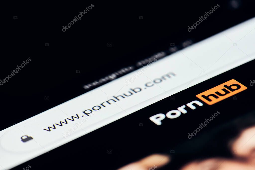 California, United States - 25 November 2021: Pornhub - worlds leading free porn site. Pornhub logo on the mobile phone screen. Porn addiction. User browsing Pornhub.com on smartphone