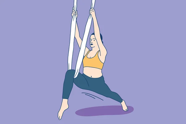 Havadan yoga yapan güzel bir kadın.