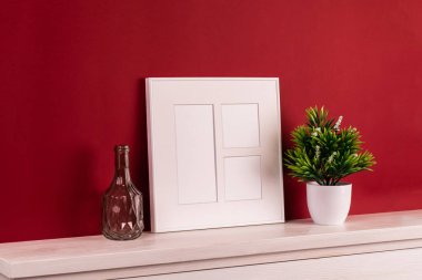 Süslemeli beyaz resim çerçevesi. Fotoğrafın ya da mesajın için hazırlan. İşinizi, baskı sanatınızı, beyaz altyapınızı yerleştirin. Fotogerçekçi 3D çizim. Kırmızı arkaplan