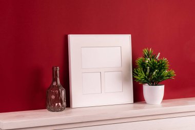 Süslemeli beyaz resim çerçevesi. Fotoğrafın ya da mesajın için hazırlan. İşinizi, baskı sanatınızı, beyaz altyapınızı yerleştirin. Fotogerçekçi 3D çizim. Kırmızı arkaplan