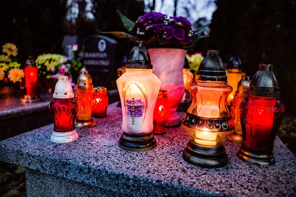 Colorful candles on the cemetery at All Saints Day, Poland. Colorful candles on the cemetery at All Saints Day, Poland