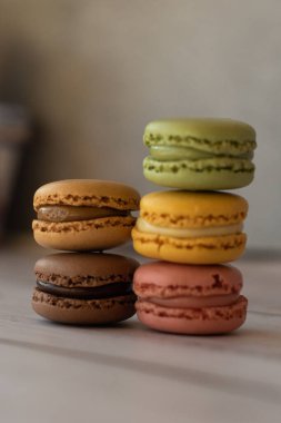 colorful macaroons close-up on gray background. selective focus