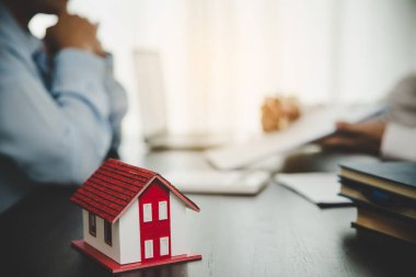 Broker advisor consulting a client. Real estate agent offer hand for customer sign agreement contract signature for buy or sell house. Business mortgage concept and insurance home