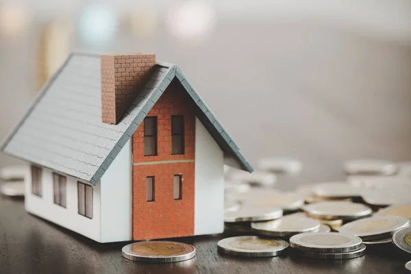 House Model Money Coins Stacks Blur Table Background Savings Plans — Stock fotografie