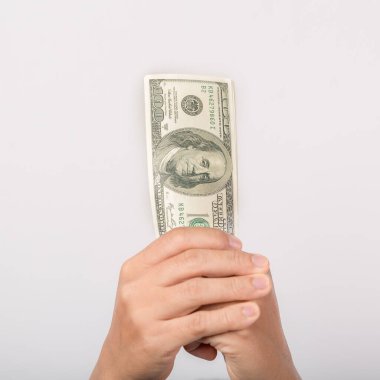 Close up of woman hand holding 100 dollar bills. success business female happy with many money banknote. Finance and economics concepts.