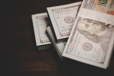close up many banknote 100 us dollar - american currency, bill cash money background, concept for finance bank, success business investment, wealth rich, saving