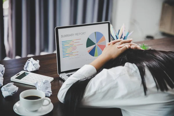 Stress business woman person from hard work, depression in office. Tired and anxious employee female with unhappy at problem job. young businesswoman sitting sad front of laptop computer on desk.