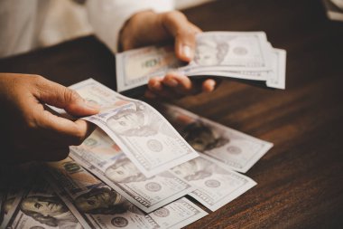 Cash money for home budget expenses. Calculation ideas for house loan, Savings for real estate, finance business payment investment for mortgage property, Agents-brokers calculate insurance on hand.