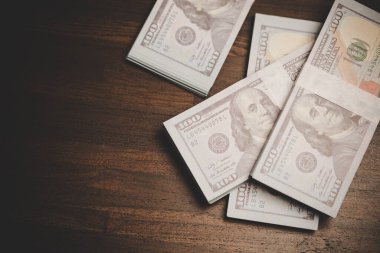 close up many banknote 100 us dollar - american currency, bill cash money background, concept for finance bank, success business investment, wealth rich, saving