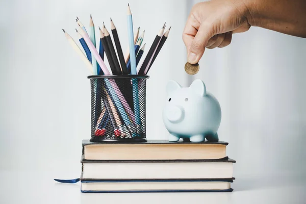 close-up education object with stack money coin-cash dollar and glass jar on background. Concept to saving money income for study, Calculating student finance costs and investment budget loan