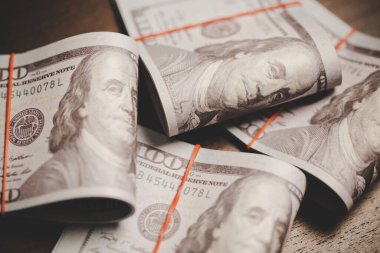 close up many banknote 100 us dollar - american currency, bill cash money background, concept for finance bank, success business investment, wealth rich, saving