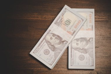 close up many banknote 100 us dollar - american currency, bill cash money background, concept for finance bank, success business investment, wealth rich, saving