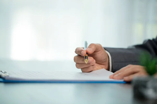Workplace Closeup Person Professional Businesswoman Sitting Desk Hold Pen Signing — Fotografia de Stock