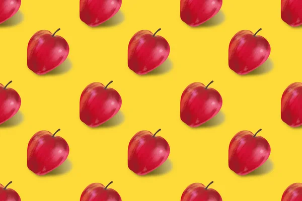 seamless pattern of ripe red apples on a yellow background.