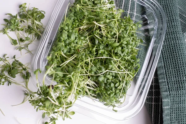 Close Appetizing Microgreens Transparent Plastic Box White Background Healthy Food — Stockfoto