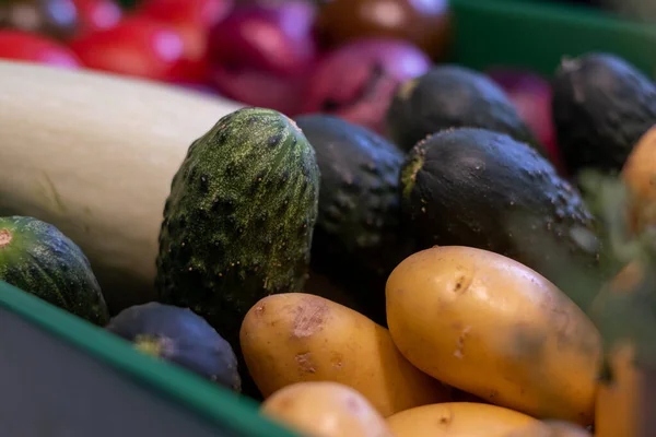 green box with vegetables, beets, potatoes, cucumbers and kitchen on background, kitchen poster, food advertisement