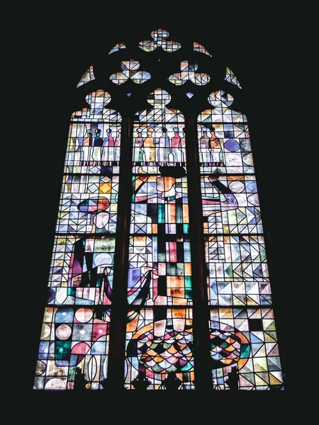 The view of a colorful window of St Peter and St Paul, Ostend, Belgium.