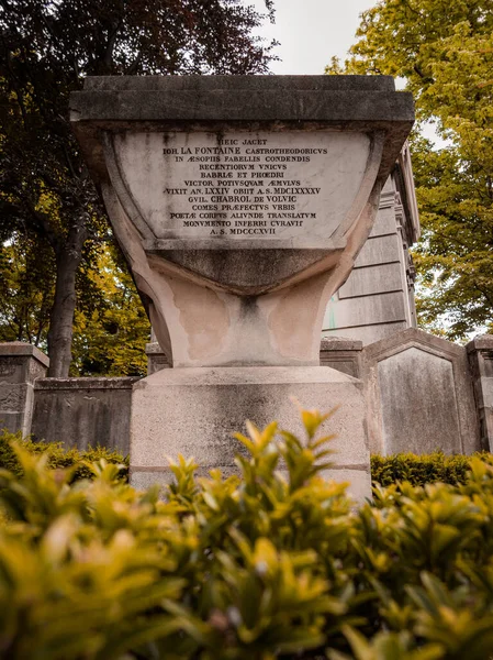 Tomb of La Fontaine in the famous Pere Lachaise cemetery. The cemetery is a tourist destination since many famous people sleep in it. June 6, 2022.