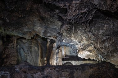  cave with columns of stalactites and stalagmites