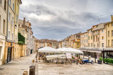 Aix-en-Provence, France - March 2022 : Historical center in cloudy weather