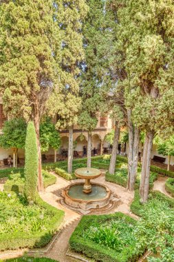 Granada, Spain - September 2020 : Alhambra gardens in sunny weather 