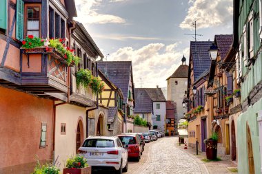           Turckheim, France - June 2022 : Picturesque village in sunny weather