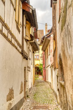           Turckheim, France - June 2022 : Picturesque village in sunny weather