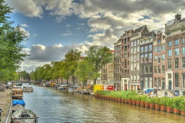 Amsterdam, Netherlands - August 2021: Historical center in cloudy weather, HDR Image
