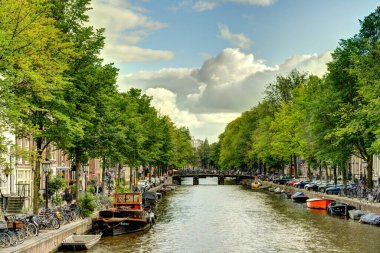 Amsterdam, Netherlands - August 2021: Historical center in cloudy weather, HDR Image