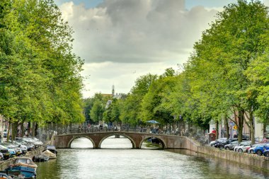 Amsterdam, Netherlands - August 2021: Historical center in cloudy weather, HDR Image