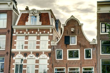 Amsterdam, Netherlands - August 2021: Historical center in cloudy weather, HDR Image