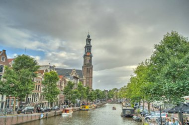 Amsterdam, Netherlands - August 2021: Historical center in cloudy weather, HDR Image